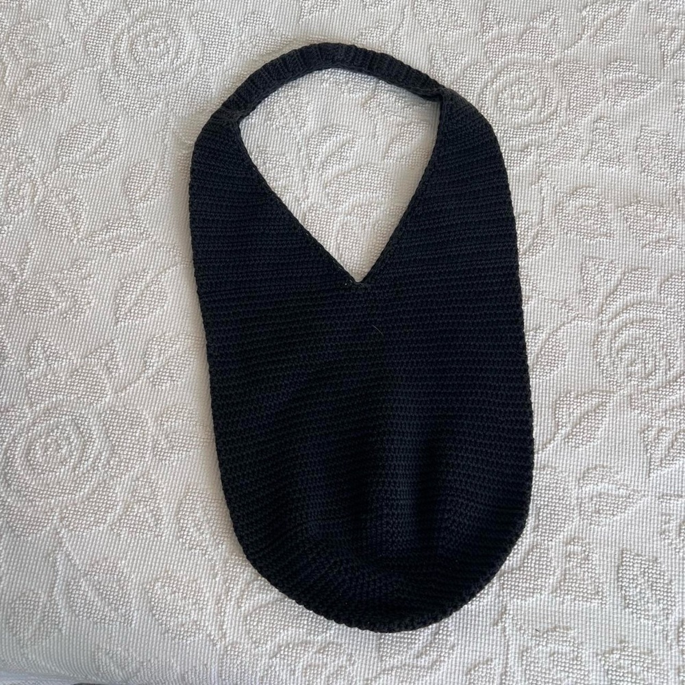 Black crochet bag, made of cotton. Durable.